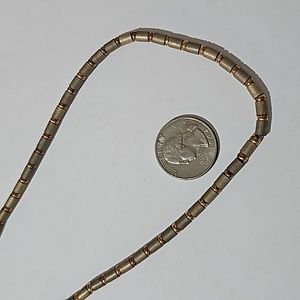 Silver and gold tone necklace tube beads